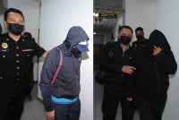 Dua pegawai Imigresen, Shamsul Hezzam (kiri) dan Mohd Asrof didakwa terlibat aktiviti 'pasport terbang'.