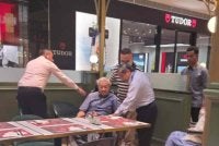 Dr Mahathir meluangkan masa menikmati kopi di pusat membeli belah, di sini pada Selasa.