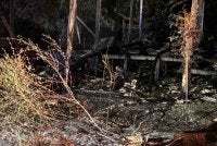 Pasukan penyelamat menemui mayat mangsa di bahagian depan rumah selepas api berjaya dipadam.