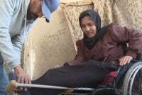 Rimas mengalami kecederaan serius pada lutut kiri selepas ditembak lima bulan lalu dan kini terpaksa bergantung kepada kerusi roda - Foto: AP