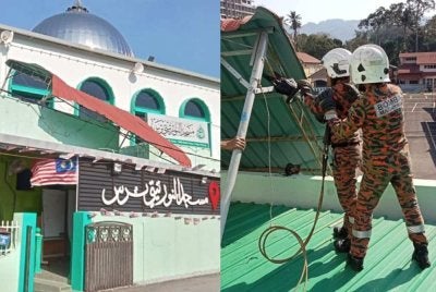 Anggota bomba menjalankan kerja-kerja pemotongan kerangka khemah yang tersangkut menggunakan peralatan khas.