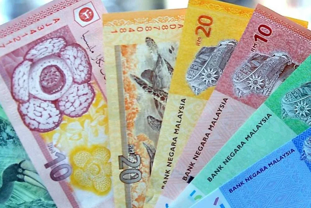 Ringgit ditutup tinggi berbanding dolar AS, mata wang utama lain serta unit serantau ASEAN pada Selasa. Foto: Bernama
