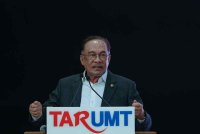 Anwar berucap pada program Sesi Temu Anwar di Universiti Pengurusan dan Teknologi Tunku Abdul Rahman (TAR UMT), Kuala Lumpur hari ini. Foto Bernama
