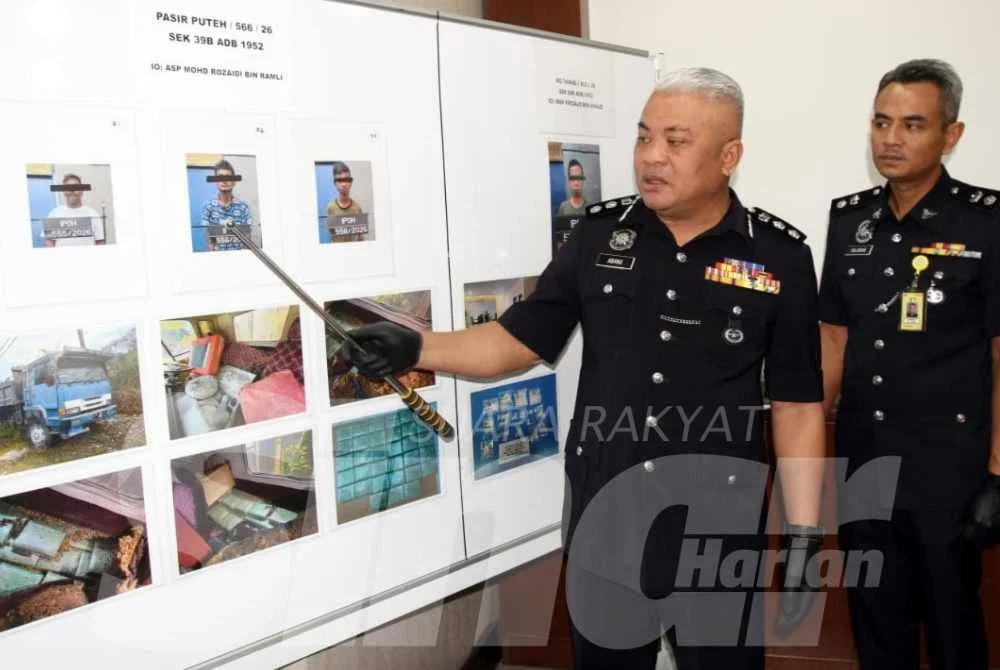 Abang Zainal Abidin menunjukkan individu dan lokasi rampasan dadah dalam serbuan ke atas sebuah lori di kawasan lombong dekat Lahat, Ipoh pada Selasa.