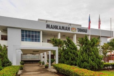 Seorang lelaki didenda RM20,000 oleh Mahkamah Majistret Tawau kerana memiliki sekeping kad ATM yang bukan miliknya. - Gambar hiasan