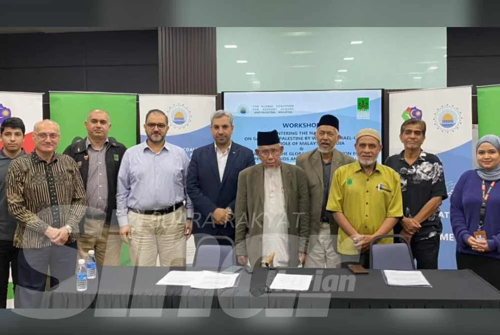 Pengurusan Mapim bersama wakil media dan ahli akademik yang hadir ke bengkel 'Menangani Naratif Genosid Gaza dan Palestin oleh Media Barat-Israel: Peranan Media Malaysia’ di Kompleks Karangkraf pada Ahad. 