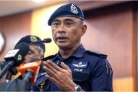 Fadil ketika mengadakan sidang media di Ibu Pejabat Polis Kontinjen Kuala Lumpur pada Ahad. Foto Bernama