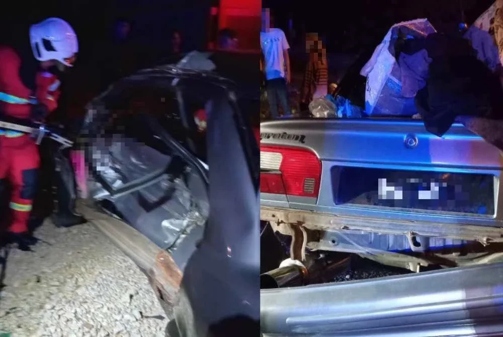 Anggota bomba mengeluarkan mangsa yang tersepit menggunakan peralatan khas.