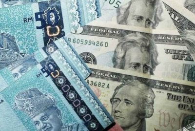 Ringgit dijangka kekal kukuh sekitar RM3.92 hingga RM3.94 berikutan kelemahan dolar AS. Gambar hiasan 