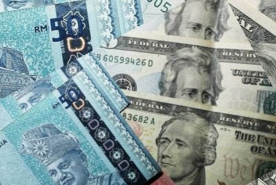 Ringgit meneruskan momentum pengukuhannya apabila mengakhiri urus niaga pada Selasa dengan mencecah semula paras 3.92 berbanding dolar AS. Foto hiasan