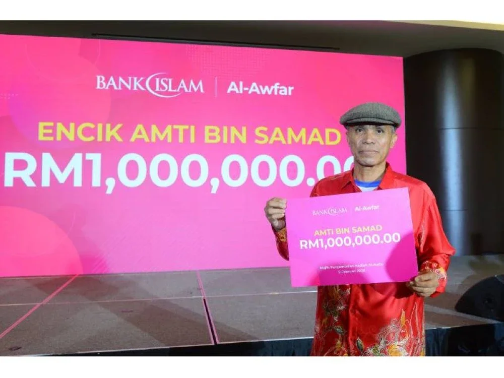 Pemenang utama wang tunai RM1 juta kempen Al-Awfar, Amti.