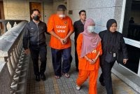 Perintah reman terhadap kedua-dua suspek dikeluarkan oleh Majistret Ezrene Zakariah selepas permohonan dibuat SPRM di Mahkamah Majistret Putrajaya pada Rabu. Foto: SPRM