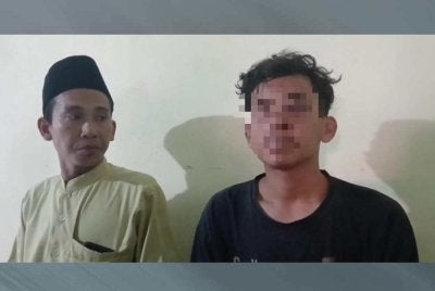 MM (kanan) mendakwa dirinya dibelasah dan dipermalukan orang ramai. Foto Agensi