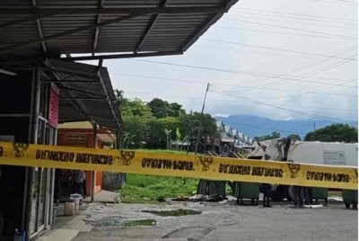 Lokasi mayat mangsa ditemukan dalam keadaan anggota badan dikerat sebelum dibuang di kawasan pembuangan sampah di Taman Indah Permai.