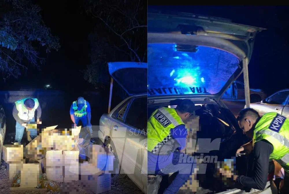 Pihak berkuasa KPDN memeriksa kandungan dalam kotak.
Foto: SINAR HARIAN/ADILA SHARINNI WAHID