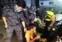 Warga Pakistan yang ditahan dalam serbuan di Apartmen Seri Semarak, Bukit Beruntung pada Khamis lalu. 