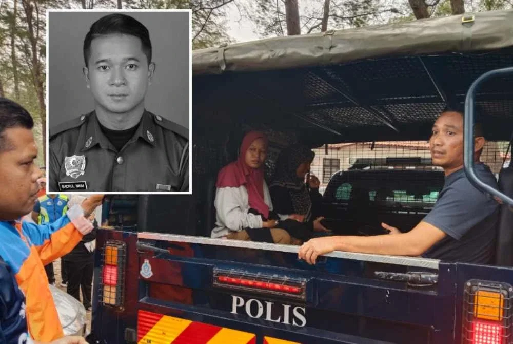 Jenazah Allahyarham Badrul Naim dibawa menggunakan kenderaan polis ke hospital. 