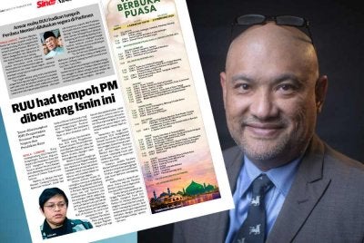 Pushpan (kanan) dan laporan Sinar Harian pada Sabtu.