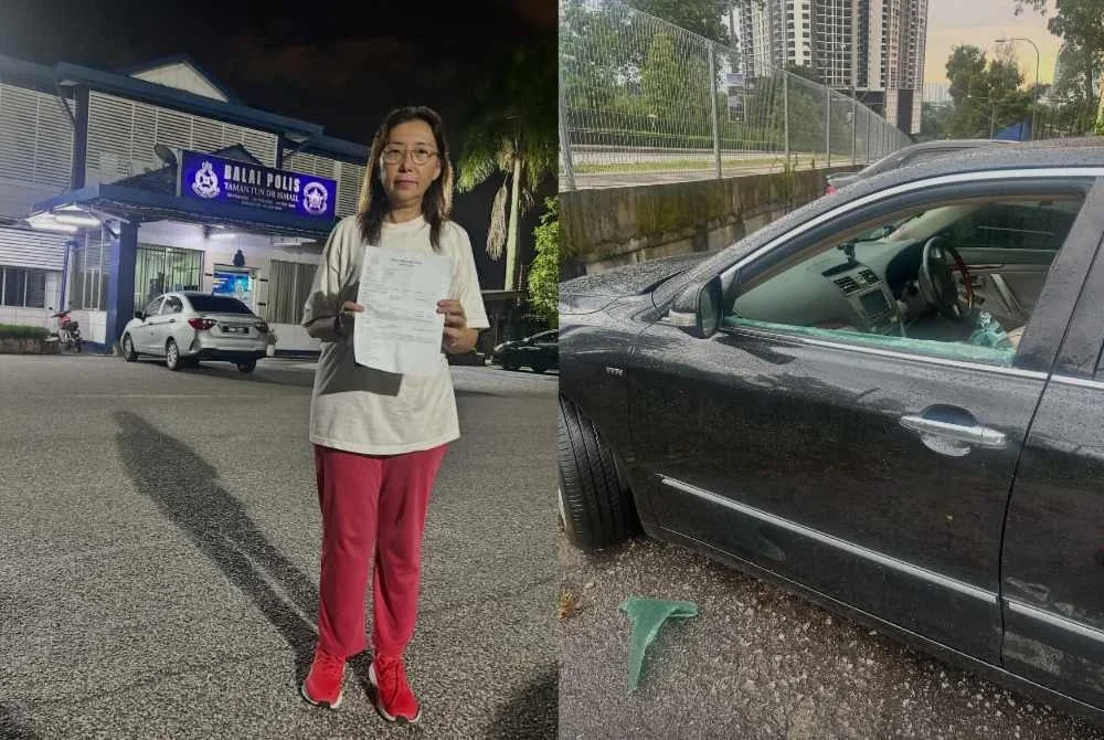 Teresa membuat laporan di Balai Polis TTDI selepas cermin kereta dipecah di Taman Persekutuan Bukit Kiara pada Ahad.