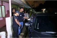 Antara individu yang ditahan Jabatan Imigresen Malaysia di Banting di sini pada Ahad.