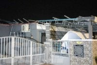 Keadaan rumah penduduk yang rosak akibat ribut ketika tinjauan di Taman Damai pada Selasa.