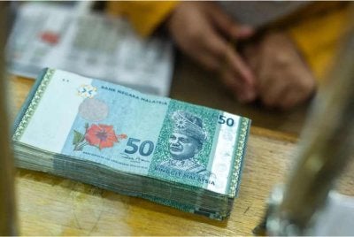 Ringgit turut diniagakan meningkat berbanding mata wang utama lain serta mata wang ASEAN pada Rabu. Gambar hiasan

