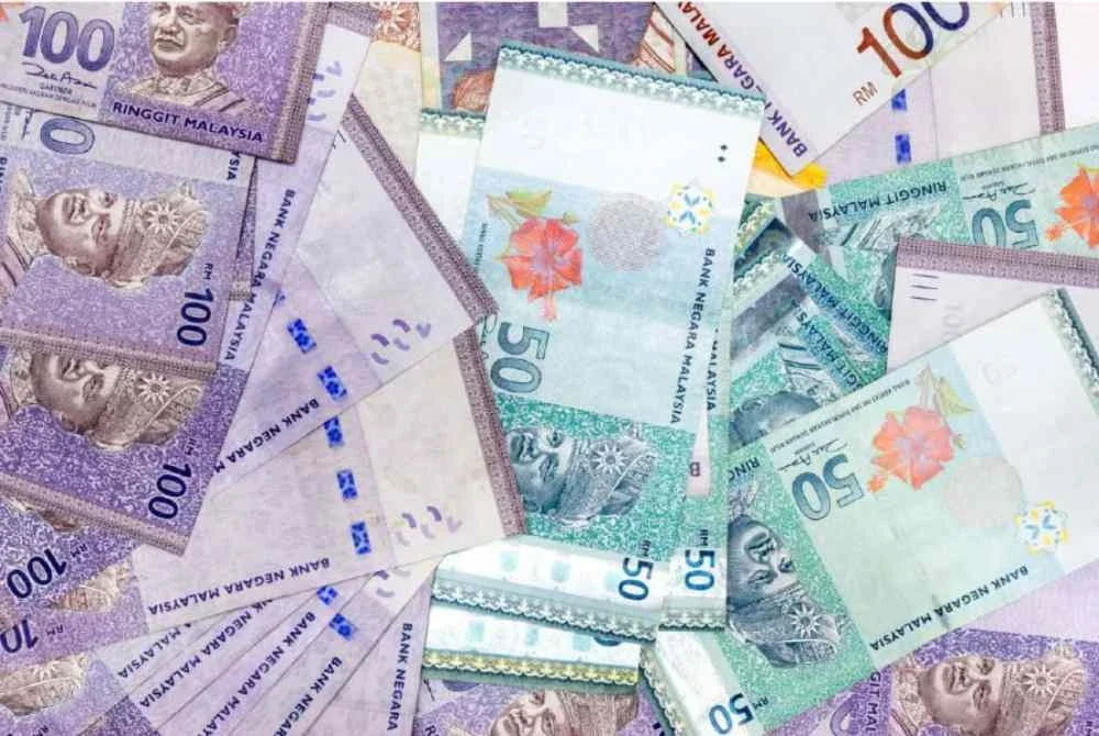 Ringgit dibuka kukuh berbanding dolar AS disokong penurunan hasil Perbendaharaan AS. Gambar hiasan 