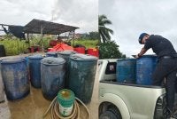 Diesel yang disimpan dalam tong drum dan disorok di stor haram di Kampung Segaliud, Sandakan, diserbu penguatkuasa KPDN.