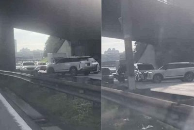 Tangkap layar rakaman video tular memaparkan sebuah kenderaan SUV melawan arus di Lebuhraya Persekutuan arah Kuala Lumpur pada Khamis.