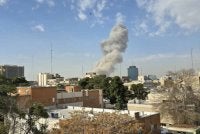 Asap tebal kelihatan di Teheran selepas Israel lancarkan serangan.-Agensi