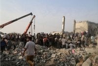 Orang ramai dan pasukan penyelamat bekerja sama membantu mangsa selepas serangan Israel ke atas sebuah sekolah di Minab, Iran pada hari Sabtu - Foto Reuters