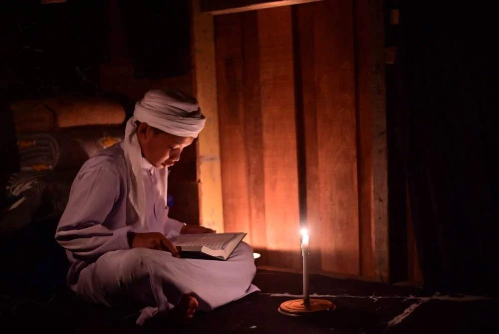 Wan Muhammad Imran tekun membaca al-Quran dan menjadikan ia sebagai antara amalan utama sepanjang bulan Ramadan bagi mengukuhkan lagi hafazan.