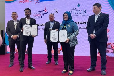 King Sing menyaksikan pemeteraian MoU antara ITC dan AMSPA sempena pameran pelancongan antarabangsa ITB Berlin di Jerman.