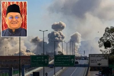 Mohd Arifin (gambar kecil) memberitahu, lebih 400 pelajar terbabit dilaporkan berada dalam keadaan selamat dan terkawal susulan konflik yang melanda Asia Barat. Foto: Agensi 