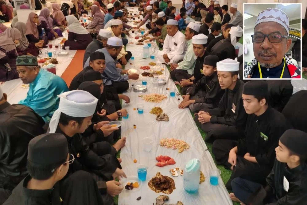 Tetamu yang hadir berbuka puasa pada majlis yang diadakan Sabtu lepas. Gambar kecil: Adnan. Foto: PRNNK