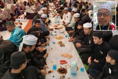 Tetamu yang hadir berbuka puasa pada majlis yang diadakan Sabtu lepas. Gambar kecil: Adnan. Foto: PRNNK