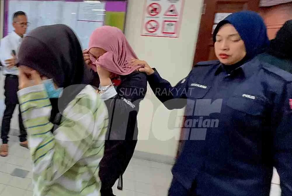 Dua wanita antara lapan individu dihadapkan ke mahkamah, pada Selasa.