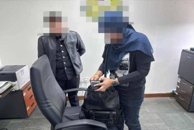 Seorang lelaki merupakan pegawai imigresen disiasat melibatkan sindiket pembantu rumah asing. Foto: JIM 