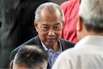Muhyiddin hadir di Kompleks Mahkamah Kuala Lumpur pada Rabu pada hari ketiga perbicaraan kes terhadap tujuh pertuduhan menyalahgunakan kedudukan serta pengubahan wang haram yang dihadapinya. Foto Bernama 