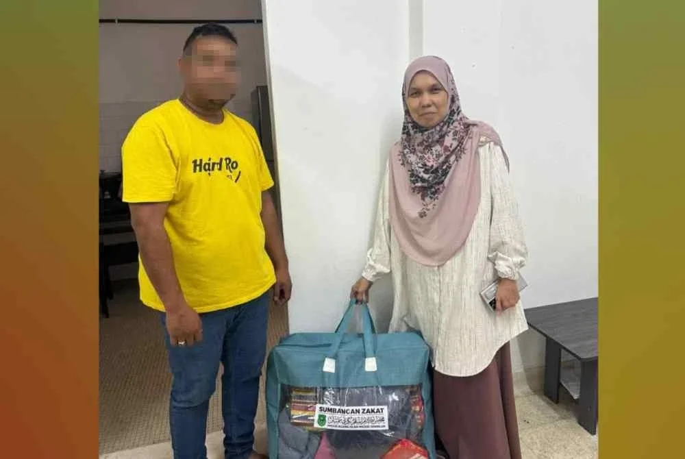MAINS turut memberikan sumbangan kepada keluarga berkenaan. Foto MAINS