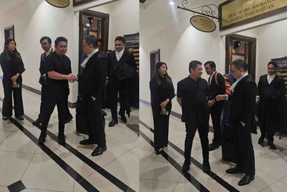 Fairuz bersama peguamnya, Rizwandean selepas mahkamah menetapkan keputusan petisyen pilihan raya bagi DUN Pintasan di Mahkamah Kota Kinabalu.