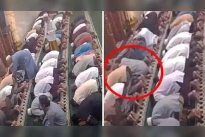 Rakaman CCTV menunjukkan Marji berada dalam posisi sujud tanpa bergerak. Foto Agensi