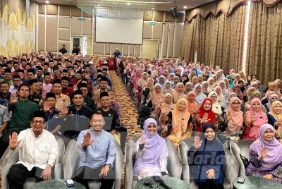 Marhamah (tengah) bersama guru KAFA di negeri Kelantan semasa program Tausiah Khas di Kota Bharu pada Selasa.Foto: HAZELEN LIANA KAMARUDIN