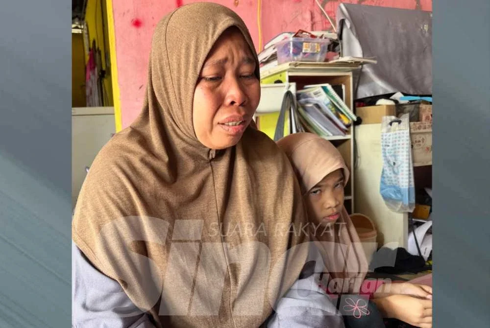 Nur Zawahir (kiri) bersama Nurul Safura Nazihah (kanan).
