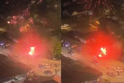 Khemah jual mercun di Kampung Dato' Sulaiman Menteri hangus terbakar, kereta dan food truck berhampiran turut musnah. - Foto tular