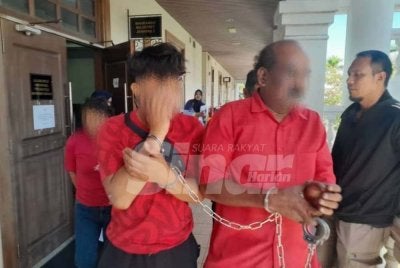 Suspek lelaki (kanan) dan wanita (belakang) yang direman tiga hari akan didakwa di mahkamah pada Khamis.
