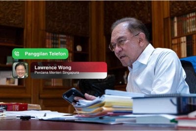 Anwar dan Lawrence senada bahawa segala pertikaian harus diselesaikan melalui dialog dan saluran diplomatik. FOTO: Facebook Anwar Ibrahim