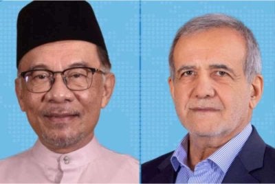Anwar Ibrahim (kiri) dan Masoud Pezeshkian. - Foto: Agensi