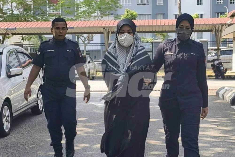 Khairunnisa dibawa polis selepas dijatuhi hukuman penjara setahun dan denda RM15,000