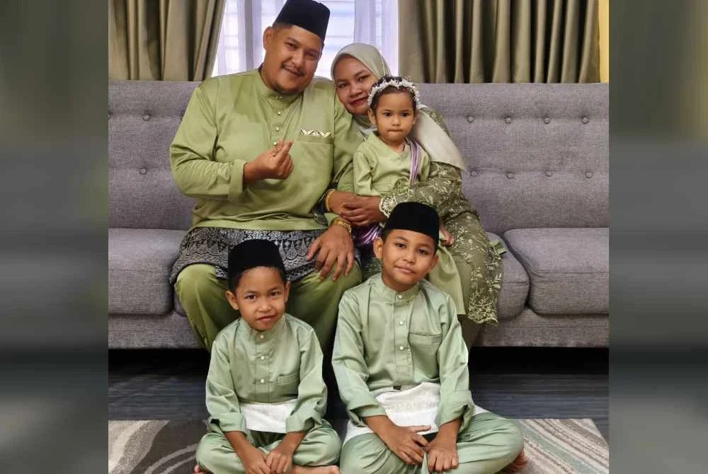 Gambar kenangan Allahyarham Amirul Hafiz bersama keluarganya.